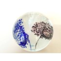 SPHERICAL GLASS PAPERWEIGHT WITH BLUE, BLACK AND WITHE FLOWERS AND 3 CONTROLLED BUBBLES