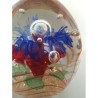 OVAL GLASS PAPERWEIGHT WITH MULTICOLORED FLOWER AND CONTROLLED BUBBLES